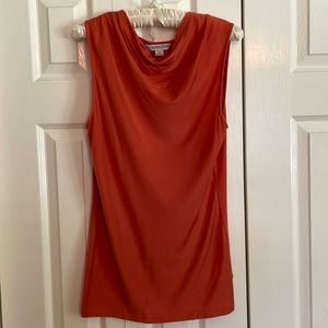Sleeveless cowl neck top.